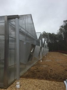 Exterior end of Appalachian style Jāderloon Greenhouse
